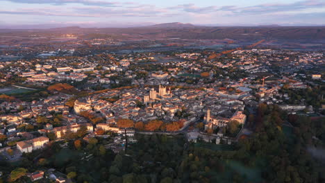 Uzès-during-the-dawn-aerial-view-France-Gard-mountains-in-background